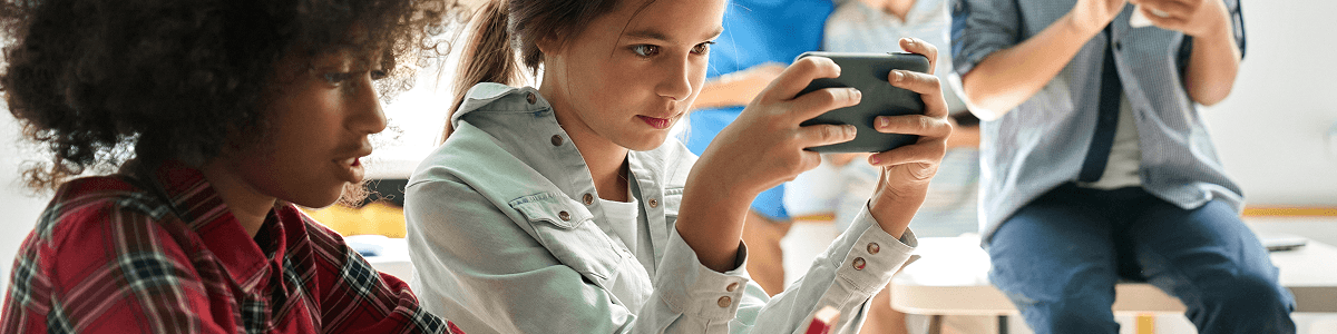 Children using tablets in a classroom